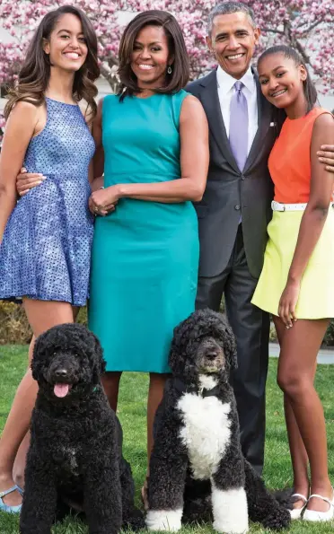  ??  ?? ‘Had to do IVF’: The Obamas with Malia, left, and Sasha plus pets Bo and Sunny in 2015