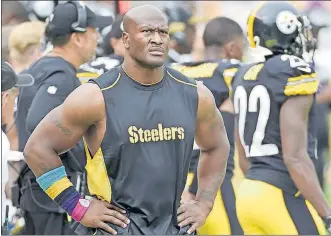  ?? VUICH/THE ASSOCIATED PRESS] [FRED ?? Linebacker James Harrison, released by the Pittsburgh Steelers on Saturday, signed with the New England Patriots. The 39-year-old was excited to join quarterbac­k Tom Brady, 40.