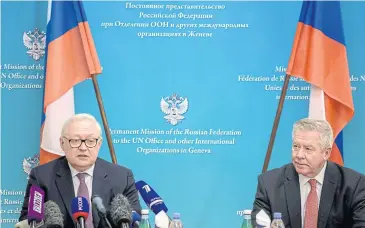  ?? AFP ?? Russian Deputy Foreign Minister Sergei Ryabkov, left, and Russian Ambassador Gennady Gatilov at a press conference after talks on soaring tensions over Ukraine, in Geneva, on Monday.