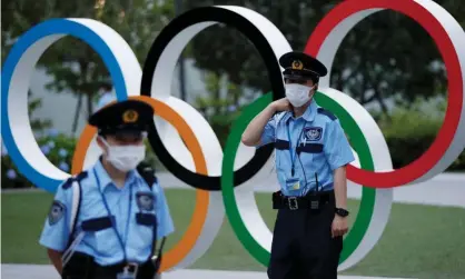  ??  ?? A new playbook for the Tokyo Olympics, released on Tuesday, sets down strict rules to avoid the transmissi­on of Covid-19. Photograph: Issei Kato/Reuters