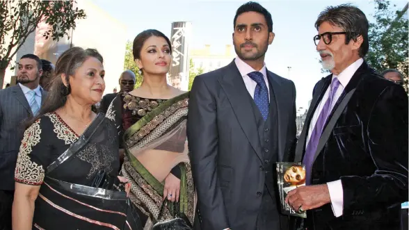  ??  ?? Bollywood royalty - Aishwarya Rai Bachchan with her husband Abhishek Bachchan and Amitabh Bachchan with his wife Jaya.
