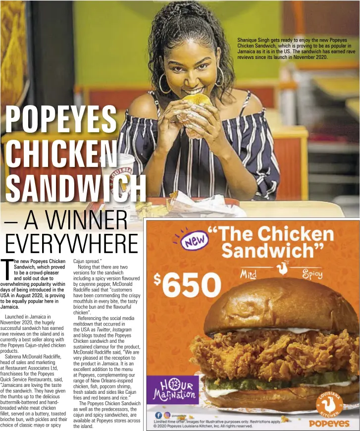  ??  ?? Shanique Singh gets ready to enjoy the new Popeyes Chicken Sandwich, which is proving to be as popular in Jamaica as it is in the US. The sandwich has earned rave reviews since its launch in November 2020.