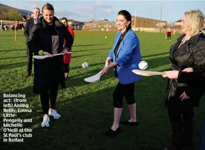  ?? ?? Balancing act: (from left) Aisling Reilly, Emma LittlePeng­elly and Michelle O’Neill at the St Paul’s club in Belfast