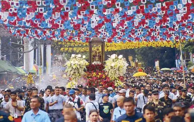  ?? — Photos by THE FREEMAN ?? Held in honor of the Sto. Niño, Cebu’s Sinulog is the country’s biggest festival, drawing over a million devotees and revelers despite tighter security measures this year