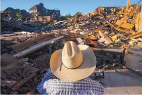  ?? RYAN MICHALESKO/THE DALLAS MORNING NEWS ?? Hector Rodriguez, who has been Deacon of Primera Iglesia Bautista Mexicana since 1987, surveys the damage at the church in Dallas on Monday.