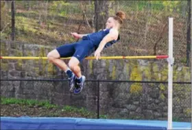  ??  ?? Pottstown’s Aaron Diamond clears the bar in the high jump during last week’s dual against Pottsgrove. Diamond finished second.
