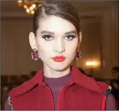  ??  ?? A Paul Costelloe model at London Fashion Week wearing Panama Studs earrings from the Freyja collection by Bláithín Ennis of Gorey.