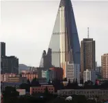  ??  ?? White elephant: The Ryugyong Hotel in North Korea’s capital is unfinished