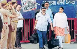  ?? PTI ?? Rajesh and Nupur Talwar walk out of Dasna jail on Monday after their acquittal in the murder case of their daughter Aarushi and help Hemraj.