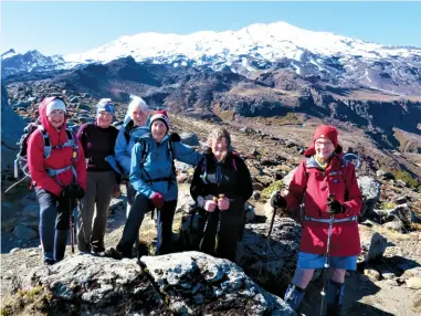  ??  ?? Above Walking over lava flow with Tongariro and Ngaruahoe in the background.
Below left: At Scoria Flat at the start of the track to Whakapapai­ti, with Ruapehu in the background.