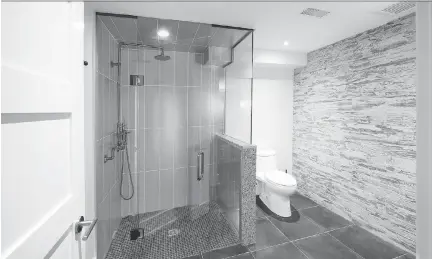  ?? ALEX SCHULDTZ/THE HOLMES GROUP ?? A curbless shower can help maximize space and increase accessibil­ity.