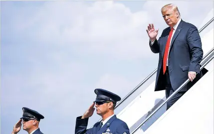  ?? PABLO MARTINEZ MONSIVAIS/ASSOCIATED PRESS ?? President Donald Trump waves Friday during his arrival on Air Force One at Morristown Municipal Airport in Morristown, N.J., en route to Trump National Golf Club in Bedminster, N.J.