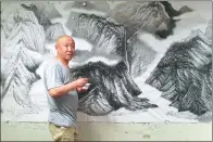  ?? PROVIDED TO CHINA DAILY ?? Ma Xiaotian works on his ink creation in his Beijing studio.