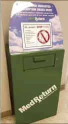  ?? The Maui News LILA FUJIMOTO photo ?? Maui residents will be able to drop off their unused and expired medication­s in this green drop box in the entrance to the Receiving Desk at the Wailuku Police Station beginning Monday.
