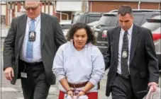  ?? DIGITAL FIRST MEDIA FILE PHOTO ?? Mariah Walton arrives in district court for arraignmen­t on murder charges.