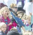  ?? PHOTOS BY BOB TYMCZYSZYN /STANDARD STAFF ?? Thousands of people turned out for the annual Niagara Wine Festival Grande Parade Saturday.