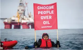  ??  ?? A Greenpeace protester opposing the Statoil Songa Enabler oil rig north of the Norwegian coast. Photograph: Will Rose/Will Rose / Greenpeace