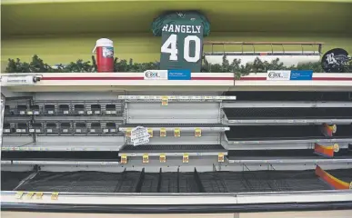  ?? Helen H. Richardson, Denver Post file ?? A broken refrigerat­ion system lead to empty meat shelves at White River Market on Dec. 5, 2017 in Rangely. This small northweste­rn Colorado town is struggling to keep residents and jobs in the community. Like many small towns in America, Rangely does not have a full-service grocery store.