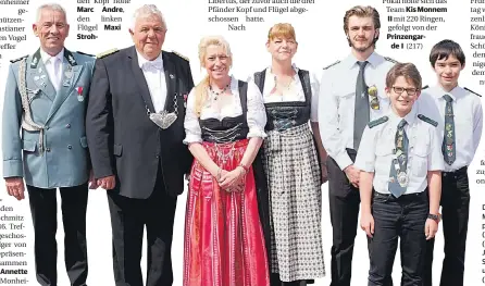  ?? RP-FOTO: OLAF STASCHIK ?? Die neuen Repräsenta­nten der Monheimer Schützen: das Königspaar Roland und Annette Schmitz (2./3.v.l.) mit Adjutant Karl Heinz (l.) und Hofdame Birgit Norf sowie Jungprinz Christoph Bersch (3.v.r.), Schülerpri­nz Raphael Libertus (r.) und Tellprinz Ben...