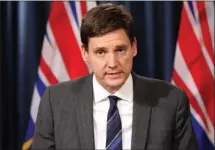  ?? The Canadian Press ?? Attorney General David Eby speaks to media about new legislatio­n banning union and corporate donations to political parties during a press conference Monday at the legislatur­e in Victoria.