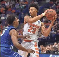  ?? JASEN VINLOVE, USA TODAY SPORTS ?? Syracuse, no typical No. 10 seed, has plenty of talent, including NBA prospect Malachi Richardson, right.