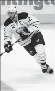  ?? CANADIAN PRESS ?? Buffalo Sabres forward Brian Gionta carrying the puck against the Columbus Blue Jackets during an NHL hockey game in Columbus, Ohio.