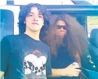  ?? COURTESY OF MIGUEL GARCIA ?? Miguel Garcia, left, jumped a fence at Warped Tour to get a photo of Claudio Sanchez from Coheed and Cambria.