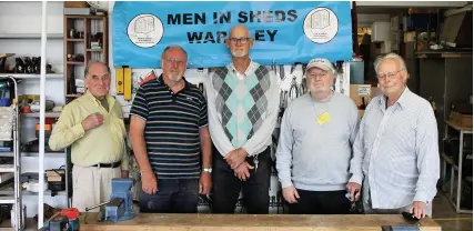  ??  ?? Mervyn, Alan, Ralph, Clive and Gareth from Warmley Men in Sheds celebratin­g the award in the workshop at Kingswood Heritage Museum