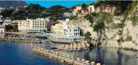  ?? REGINA ISABELLA HOTEL ?? The Regina Isabella is perched on Ischia, the biggest of the Gulf of Naples islands. Ischia was voted best island in Europe by Travel+Leisure readers.