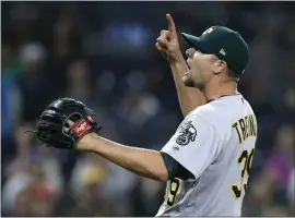  ?? ALEX GALLARDO — THE ASSOCIATED PRESS ?? A’s closer Blake Treinen reacts after striking out the Padres’ Eric Hosmer in the 10th.