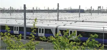  ??  ?? Going nowhere: Scores of idle Crossrail trains parked up at Old Oak Common depot