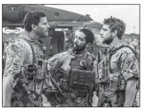  ??  ?? SEAL Team, a new military action series from CBS, stars (from left) David Boreanaz, Neil Brown Jr., and Max Thieriot. The drama debuts at 8 p.m. Wednesday.
