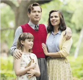  ??  ?? Bronte Carmichael, left, Ewan McGregor and Hayley Atwell seek to enjoy life’s simple pleasures while bonding as a family in Christophe­r Robin.