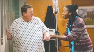  ?? CBS ?? Billy Gardell’s character is a businessma­n who falls for his Nigerian nurse, played by Folake Olowofoyek­u.