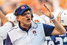  ?? VASHA HUNT/ASSOCIATED PRESS ?? Gus Malzahn, shown coaching Auburn in 2019, has a $21.5 million buyout from the school, and none of it is mitigated even though he has taken the Central Florida job.