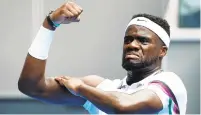  ?? MARK KOLBE/GETTY IMAGES ?? Frances Tiafoe, from the D.C. area, celebrates winning match point in his second round match against No. 5 seed Kevin Anderson.