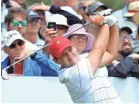  ?? WARREN LITTLE/GETTY IMAGES ?? Patrick Reed plays a shot Tuesday during practice ahead of the Presidents Cup.