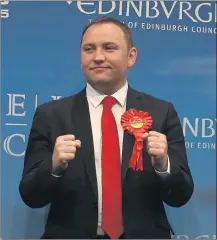  ??  ?? FLYING SOLO: Labour’s sole MP north of the Border, Ian Murray, celebrates his Edinburgh South victory on election night. Picture: Gordon Terris