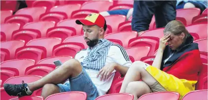  ?? REUTERS ?? End of the dream . . . German fans are devastated after their side’s 20 loss to South Koraa in the World Cup group F match in Kazan yesterday.