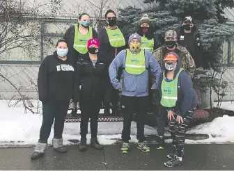  ?? TRISTAN DUFFY ?? Sharon Duffy, front right, leads this year's Nenqayni Wellness Centre's team in the Vancouver Sun Run virtual race. Pictured are nine of the 17 team members, four of whom are Sun Run first-timers.