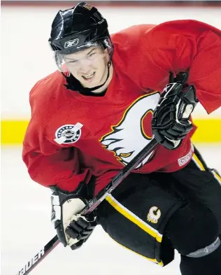  ?? GRANT BLACK/Calgary Herald ?? Former Spitfire Greg Nemisz skates in a drill at rookie camp with the Calgary Flames.