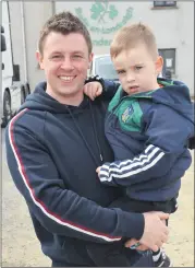  ?? (Pic: John Ahern) ?? FATHER & SON TEAM: Father and son team, Paddy and Daire O’Mahony, inspecting the trucks and tractors at last Sunday’s fundraiser in Ballylande­rs.