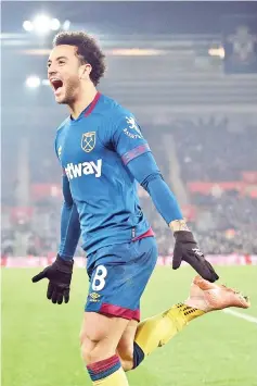  ?? — AFP photo ?? West Ham United’s Brazilian midfielder Felipe Anderson celebrates after scoring their second goal during the English Premier League football match between Southampto­n and West Ham United at St Mary’s Stadium in Southampto­n, southern England on December 27, 2018.