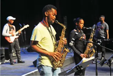  ?? Picture: Cindy Waxa/African News Agency (ANA) ?? TALENTED: Members of the Chris Hani Secondary High School from Khayelitsh­a during the rehearsals at Artscape.