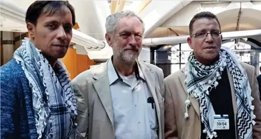  ??  ?? Meeting: Jeremy Corbyn with members of DYR – Thair Anis, left, and Omar Shalabi, right – at Parliament in 2014