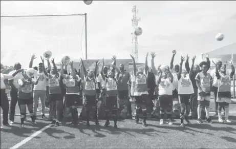  ?? ?? Players and officials of the Blue Water Shipping Girls Under-15 Developmen­tal League celebrate the official launch of the tournament