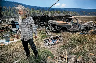  ?? AP ?? New Mexican Johnny Trujillo, 53, talks about battling the blaze that destroyed his sister’s home and his truck.