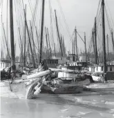  ?? B. FRANK SHERMAN COLLECTION, CHESAPEAKE BAY MARITIME MUSEUM ?? Oystermen’s boats stand frozen in Annapolis in February 1936.