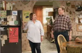  ?? ADAM ROSE — ABC VIA AP ?? This image released by ABC shows Roseanne Barr, left, and John Goodman in a scene from the comedy series “Roseanne.”