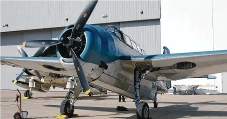  ?? Kirk Sides / Staff photograph­er ?? A World War II-era TBM-3E Avenger torpedo bomber is one of many vintage aircraft on display at the Lone Star Flight Museum.